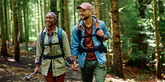Daughter hugging mother in kitchen